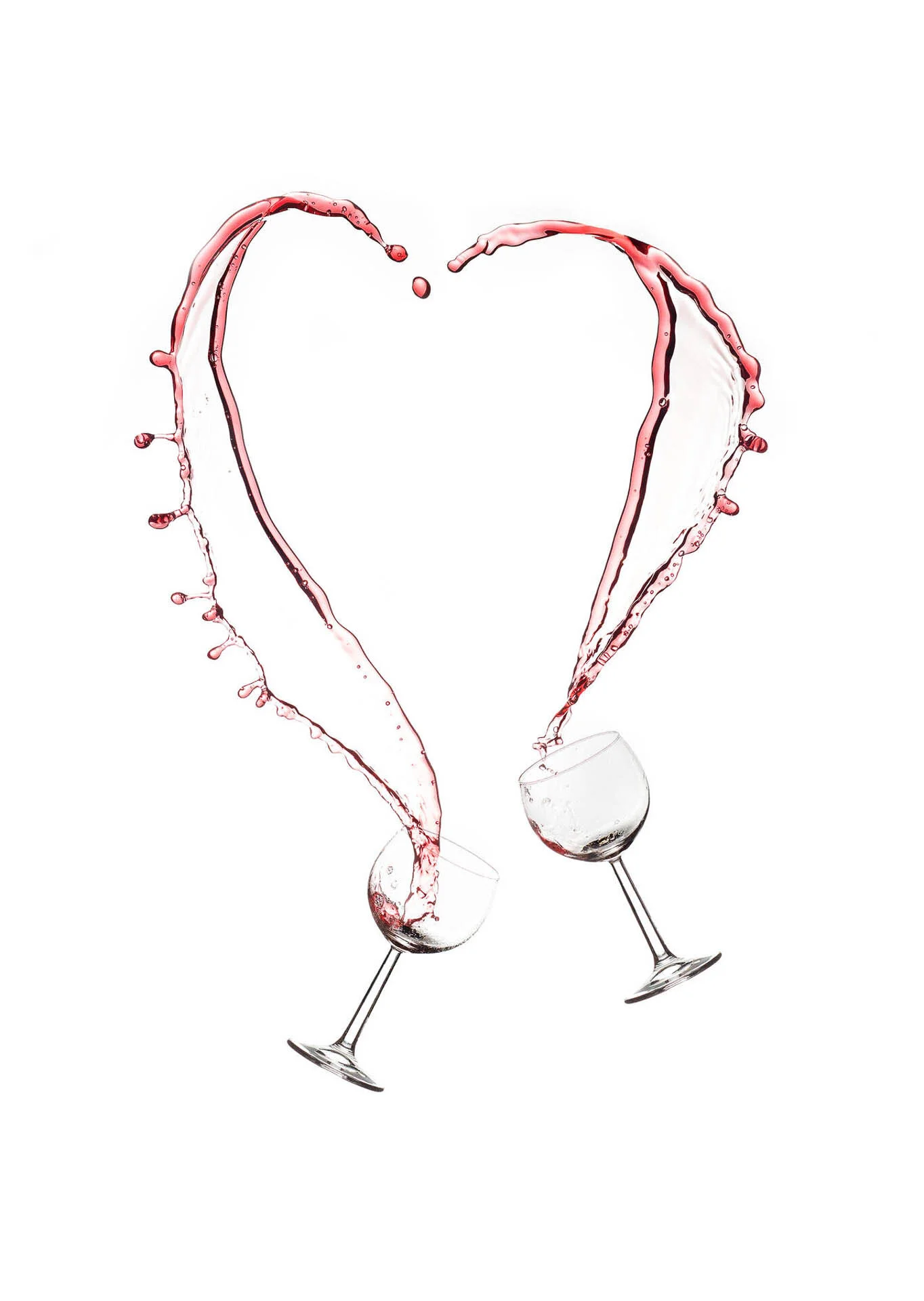 Two wine glasses splashing red wine into a heart shape against a white background.