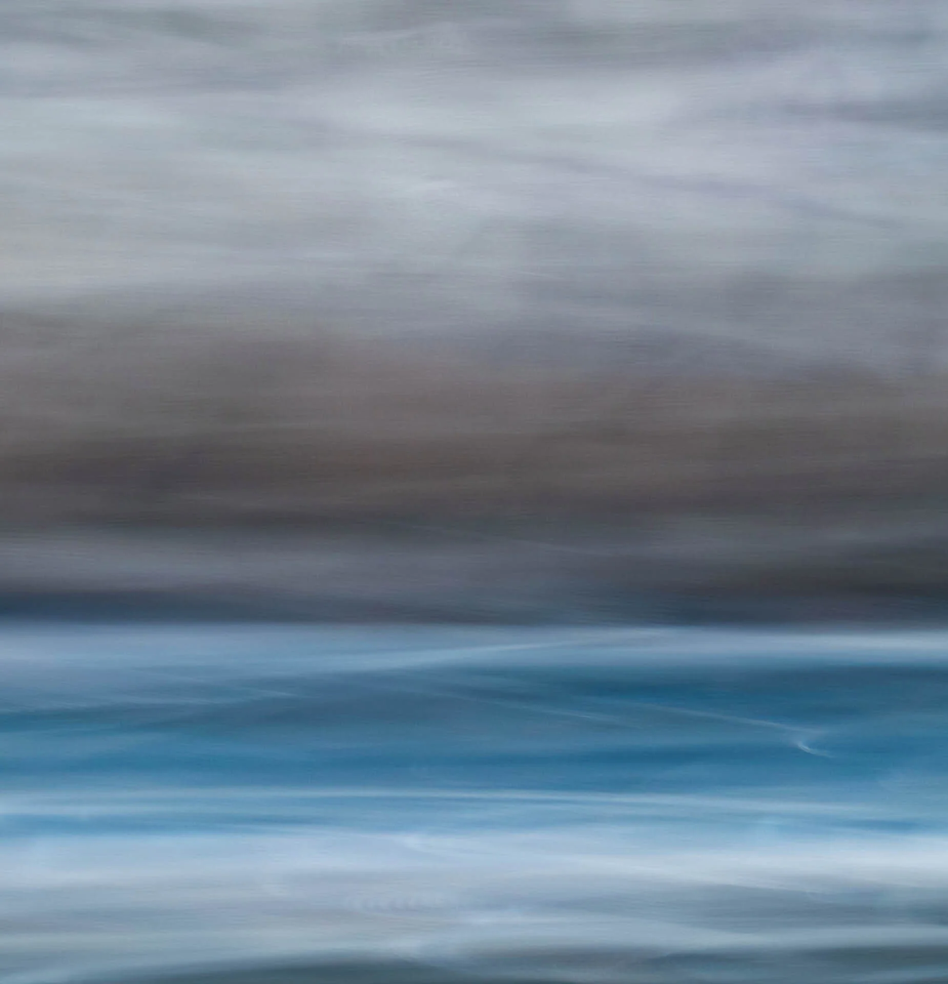 Abstract artwork with blurred horizontal waves in shades of blue and gray