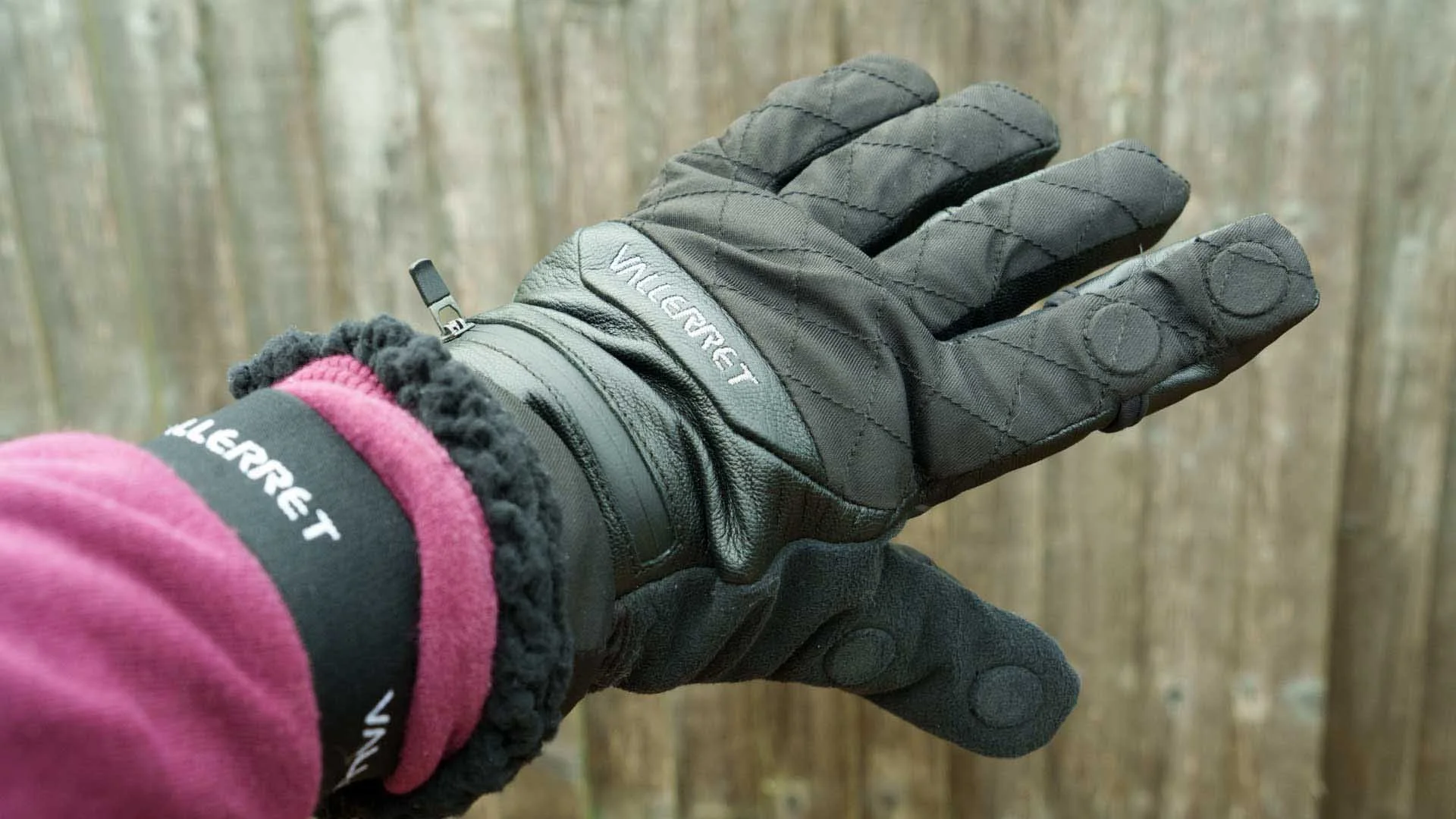  The location of the magnets is visible on the back of the gloves. 